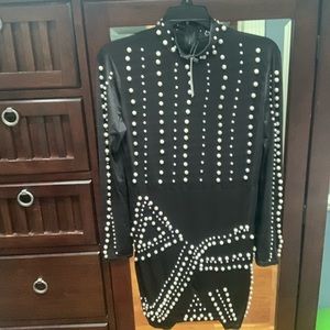 Black pearl studded dress.